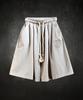 Kileutimuka Embroidered V-Tuck Shorts Beige