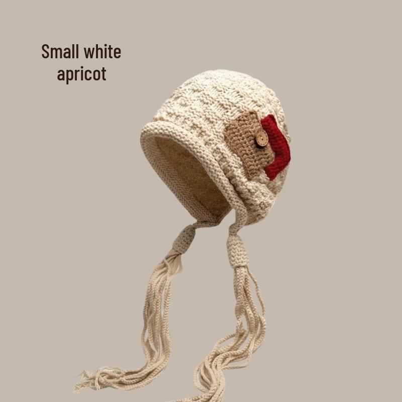Festive Red Tassel Beanie - Women's Autumn/Winter Ear Protection Hat for Christmas and New Year