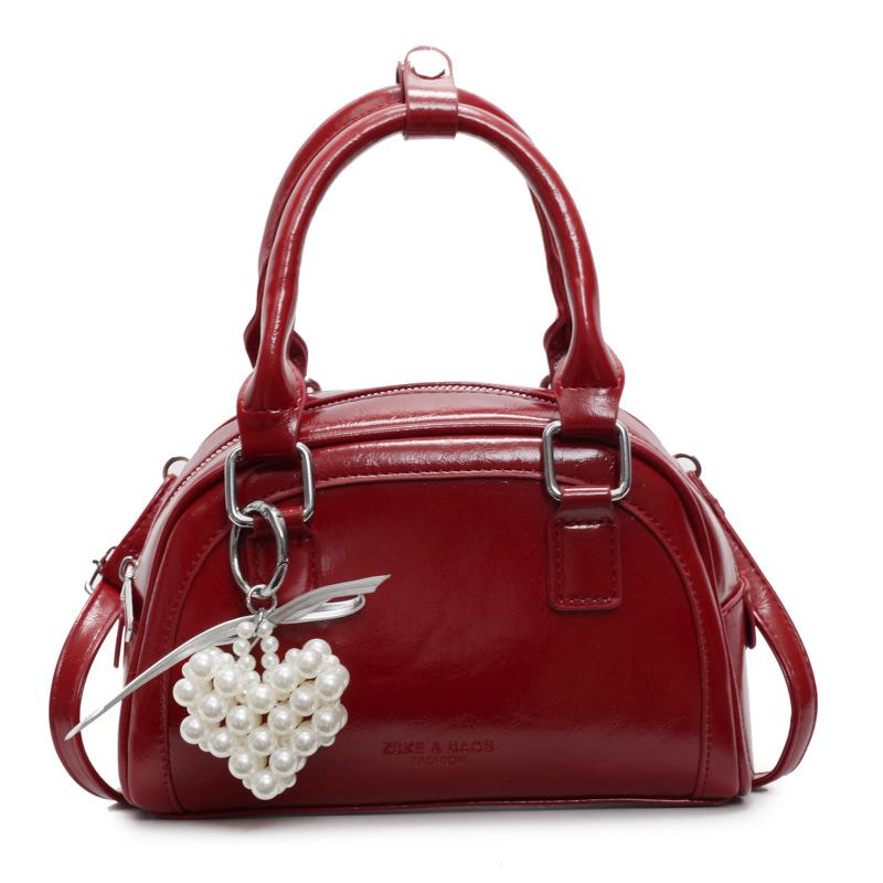 2025 New Product Casual Small Fresh Ou Ruofeng Portable Boston Bag Niche Versatile Commuter Premium Messenger Bag