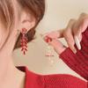 Red Firecracker Tassel Earrings for Women – Unique New Year Glaze Design, Fashionable and Versatile.