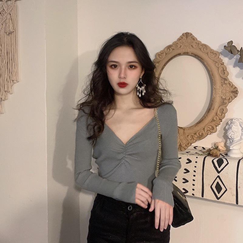 Otoño Invierno mujer cuello en V Color sólido manga larga plisado parte inferior de punto suéter elegante