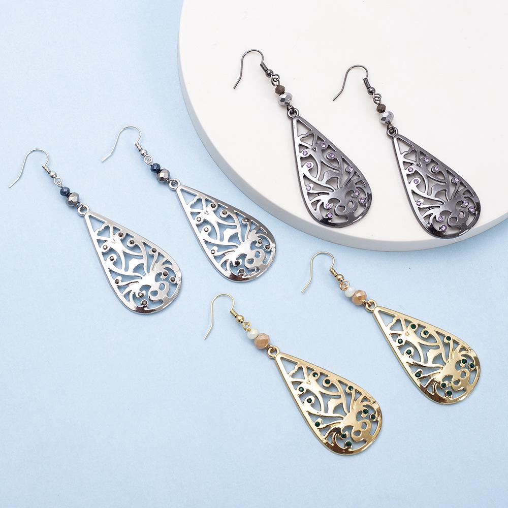 Retro Teardrop Earrings with Hollow Floral Design and Rhinestone Accents