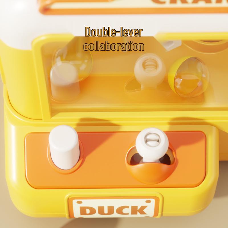 Kids' Claw Machine: Mini Home Toy for Grabbing Dolls and Gashapon - Ideal Educational Gift for Boys and Girls in Kindergarten.