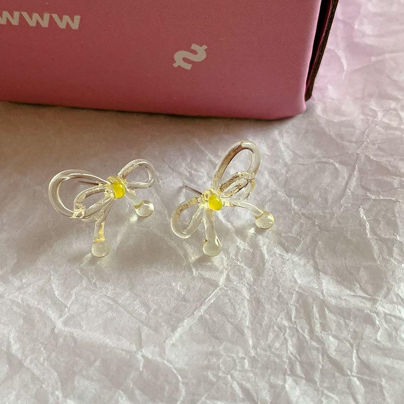 

Прозрачные серьги-пусеты в виде бантиков - Милые и универсальные для женщин