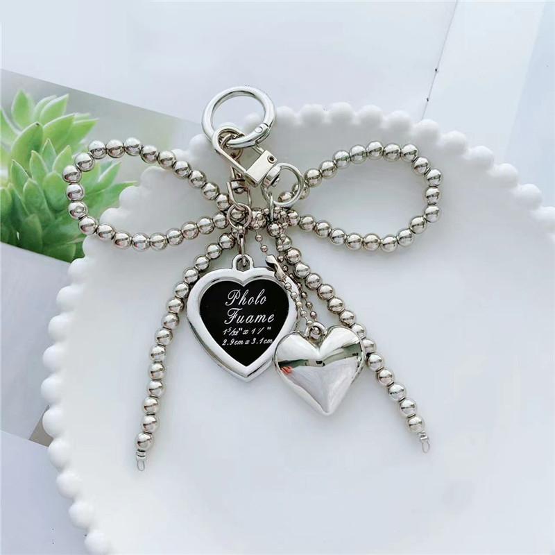 

Милый бантик, кулон в форме сердца, креативные нежные бусины, женский, для девочки, подвеска для сумки, рюкзака one size серебряный