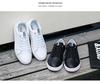 Baskets de mode décontractées basses polyvalentes blanches pour hommes au printemps