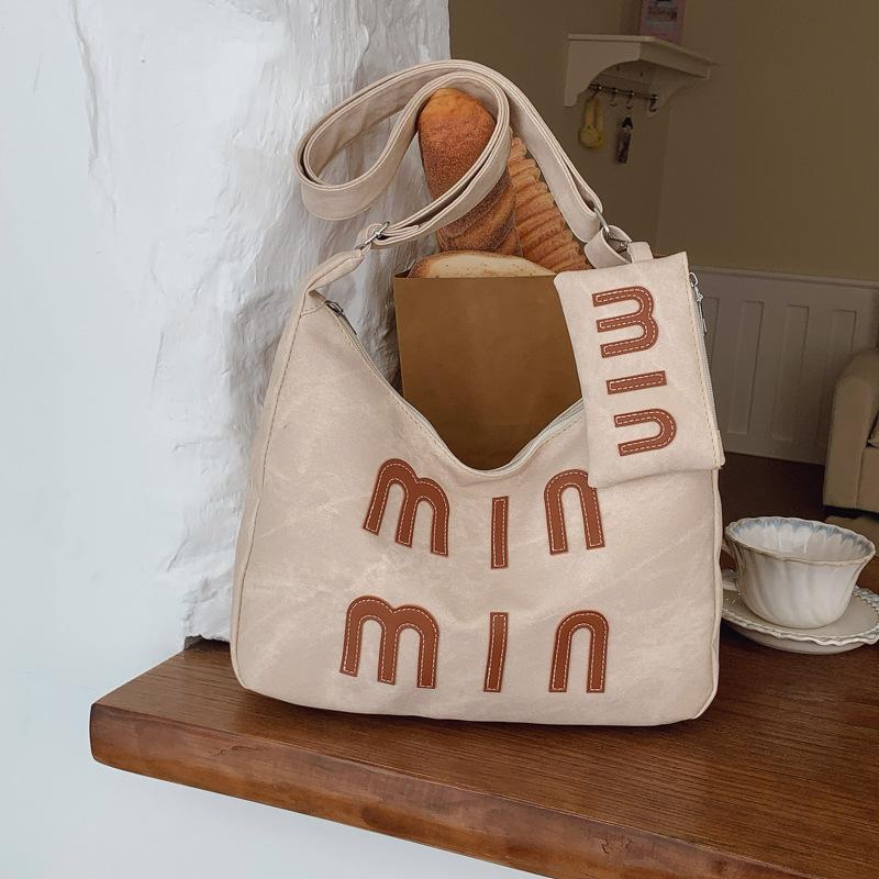 

Casual commuter retro large-capacity bag new denim fashion shoulder bag women s hand-held armpit bag хаки