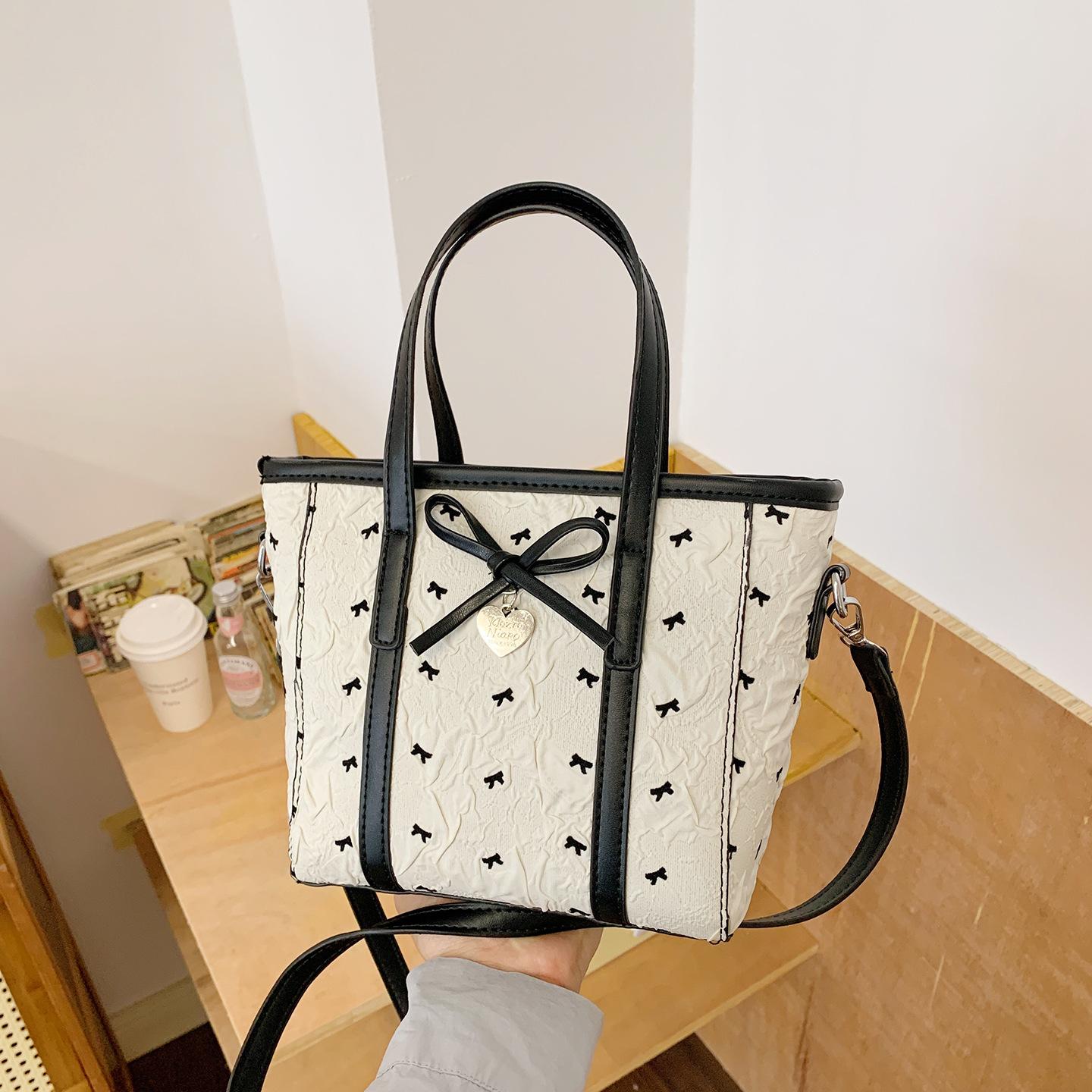 

Летняя мода портативная сумка для поездок на работу женская сумка 2025 новый маленький тоут с принтом банта сумка-мессенджер бежевый