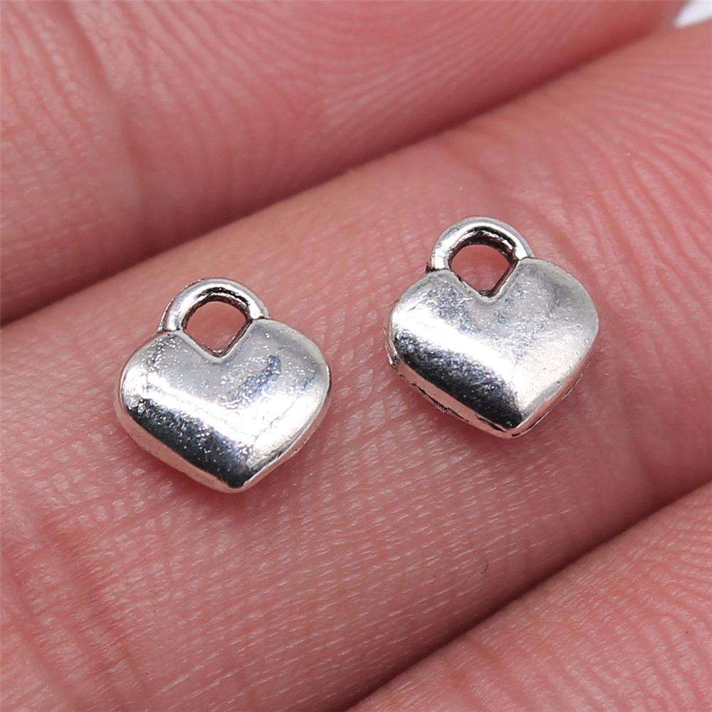 

20 шт. Подвески Античное Бронзовое Серебряное Цвета Для Изготовления DIY Ручной Работы Тибетская Фурнитура Ювелирная Полая Сердечко Шармы Для Изготовления Ювелирных Изделий