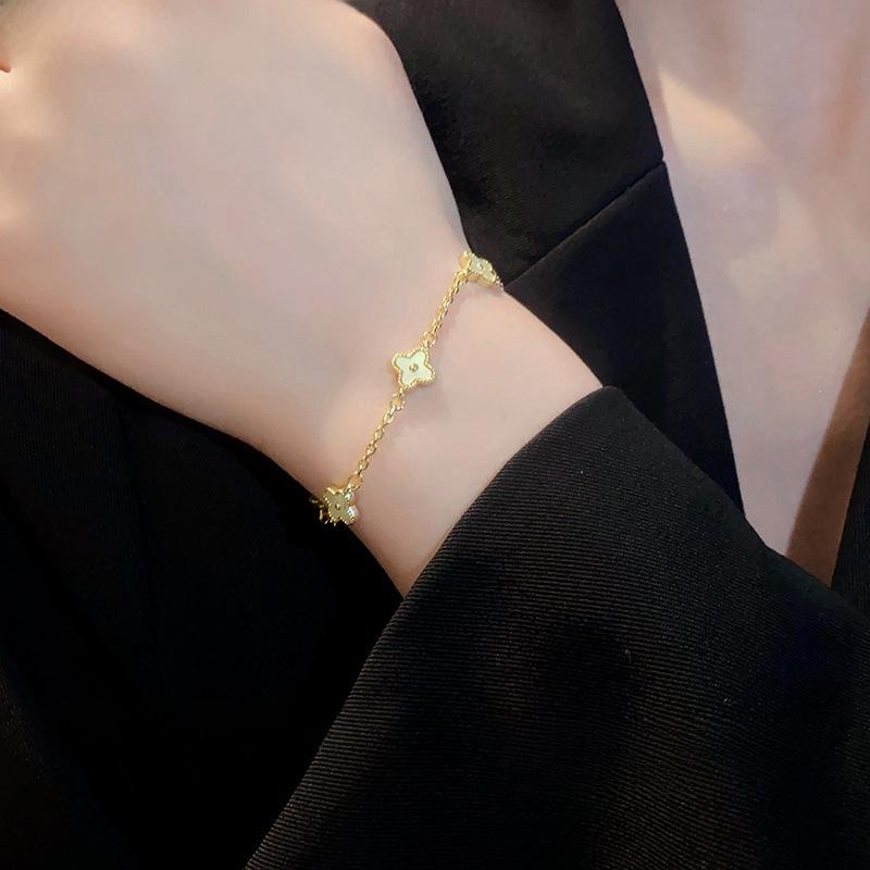 Gold Electroplated Four-Petal Flower Bracelet - Light Luxury, Sweet, High-End Hand Jewelry for Women