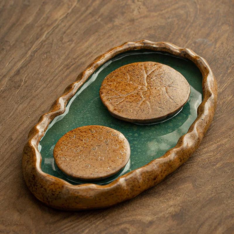 

Чайный поднос Новый тип грубой керамики Сушилка для чая с пузырьками Ручная подставка для горшка Хранение Вода Лист лотоса Чайная доска