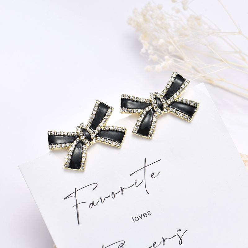 Xiaoxiangfeng French bow stud earrings pearl oil drop earrings s silver needle temperament Internet celebrity niche earrings women