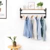 Industrial Style Wall-Mounted Clothing Display Rack with Water Pipe Design