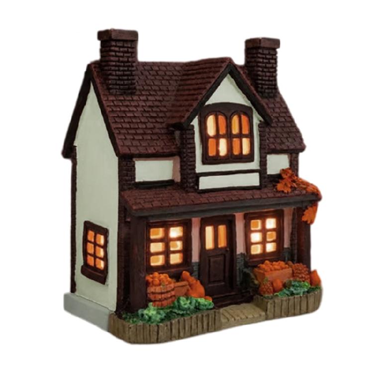 Indoor Resin Harvest House Statue with Warm Window Lighting for Halloween Shelf Styling and Seasonal Fall Scenes