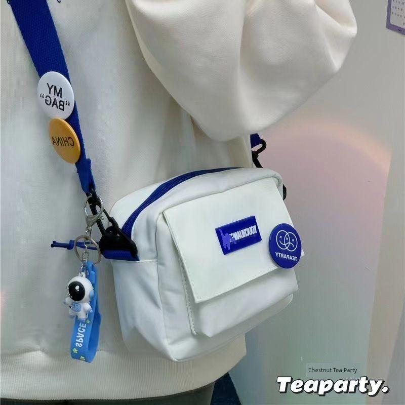 

Японский стиль Инс уличная съемка Минималистичный Легче всего сочетать Сумка-мессенджер Женская Повседневная Спортивная Нейтральная Маленькая сумка Мужская и женская Студенческая Сумка для телефона Single pack [give a badge] White