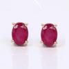 Glass Filled Ruby Oval Earrings 925 Silver Yellow Gold Plated Studs