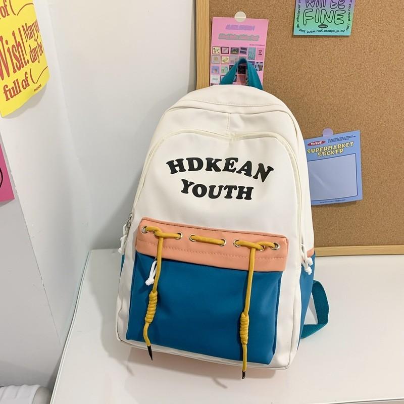 

Trendy Nylon Letter Pattern 2023 New Campus Backpack For College Girls Large Capacity Shoulder Bag синій