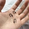 1 Box Contains About 12pcs of Hypoallergenic Ear Studs, Made of Soft Plastic Material. They Feature Drop-shaped and Transparent Hook Earrings