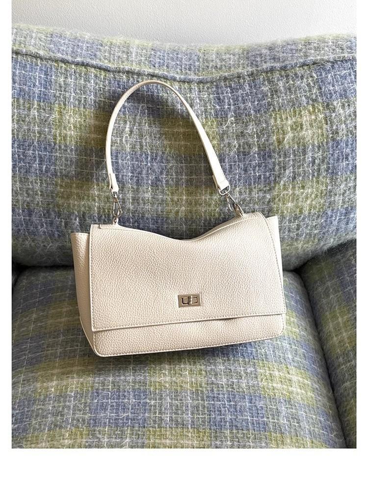 

2025 new versatile popular commuter tote bag large capacity hand carry Kelly bag Korean niche brand women s bag