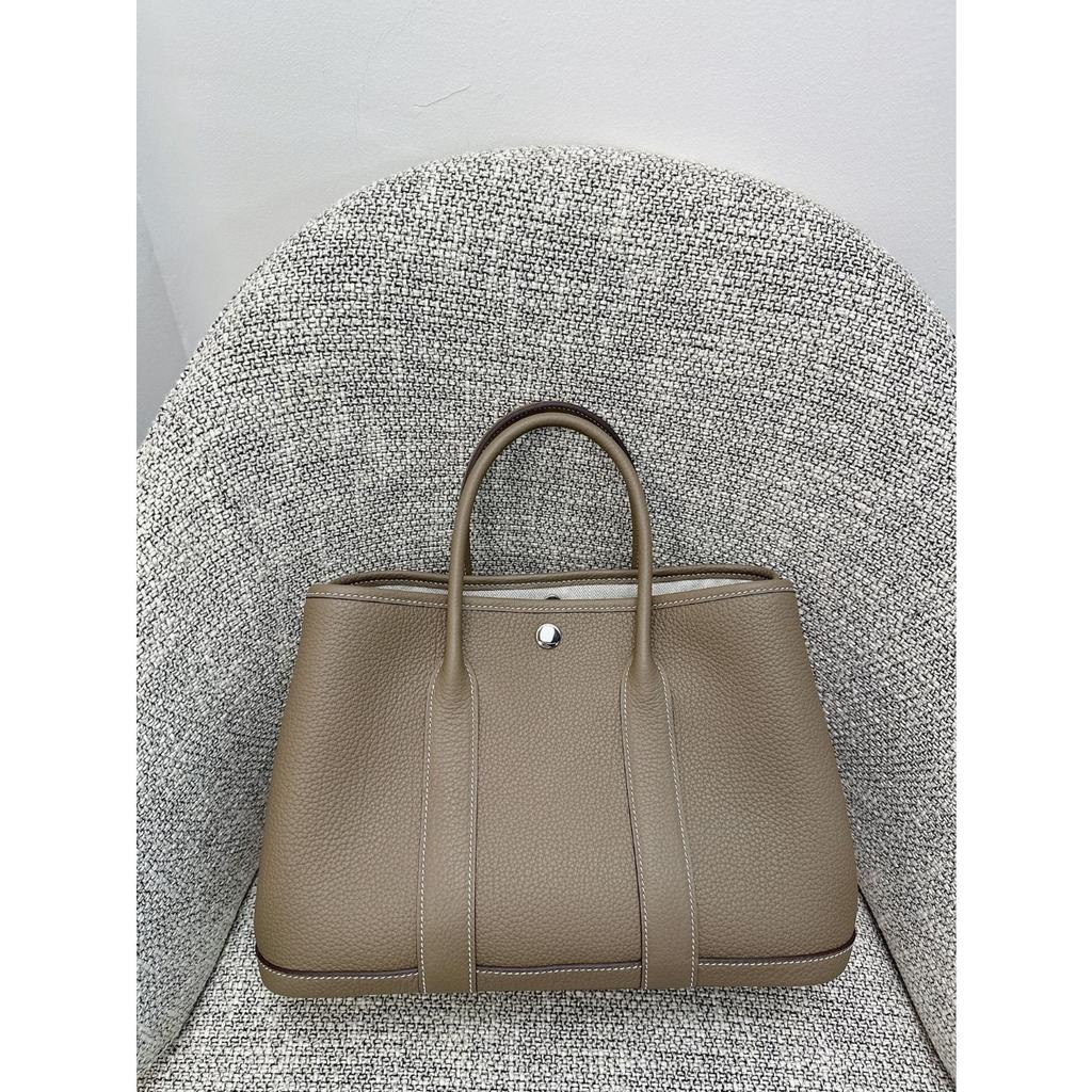 Borsa da giardino cucita a mano con filo cerato, ferramenta interamente in acciaio, borsa da donna portatile in pelle bovina primo strato con motivo a collo di mucca Ntogo