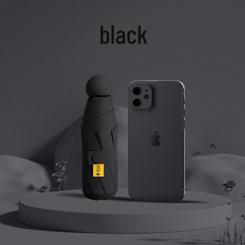 Compact Capsule Umbrella: 50% Foldable, Portable, Pocket-Size for Sunny and Rainy Days