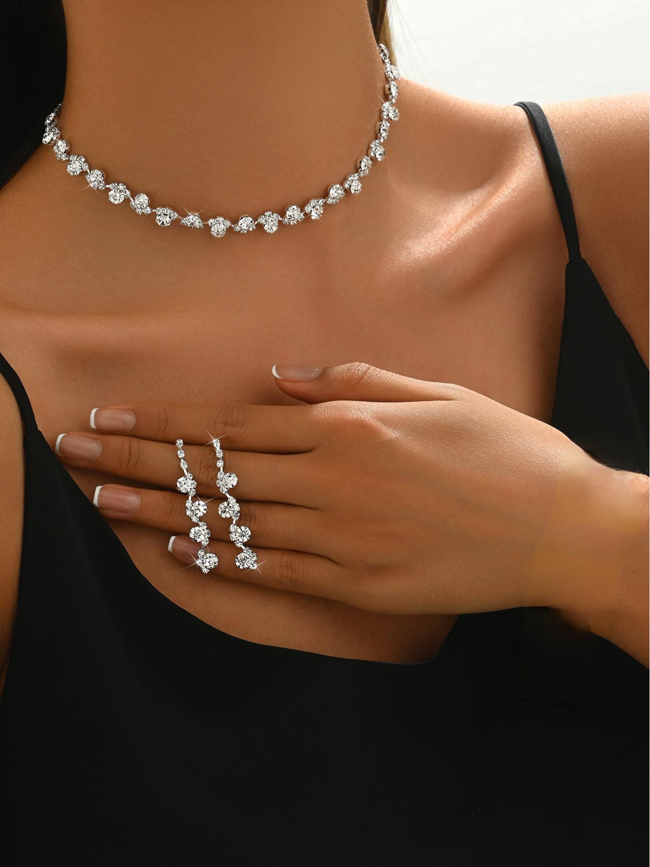 

2025 Корейська Мода Весільні Прикраси: Срібний набір з стразами: намисто, сережки, браслет та кільце