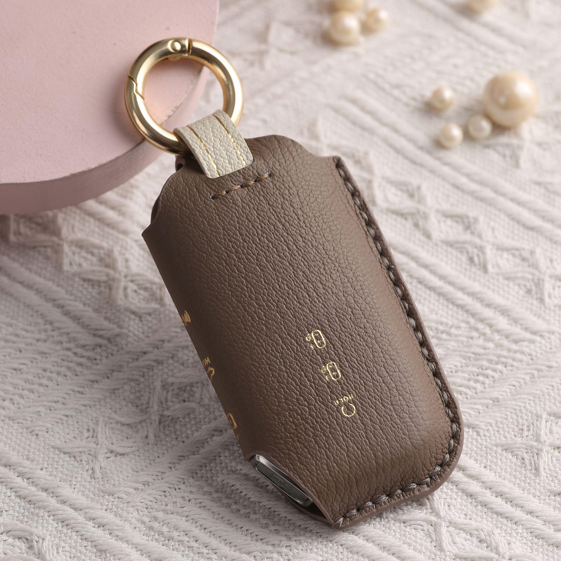 

Customized for Kia/KIA key set KN Solanto Jiahua business vehicle handmade leather shell buckle bag коричневий