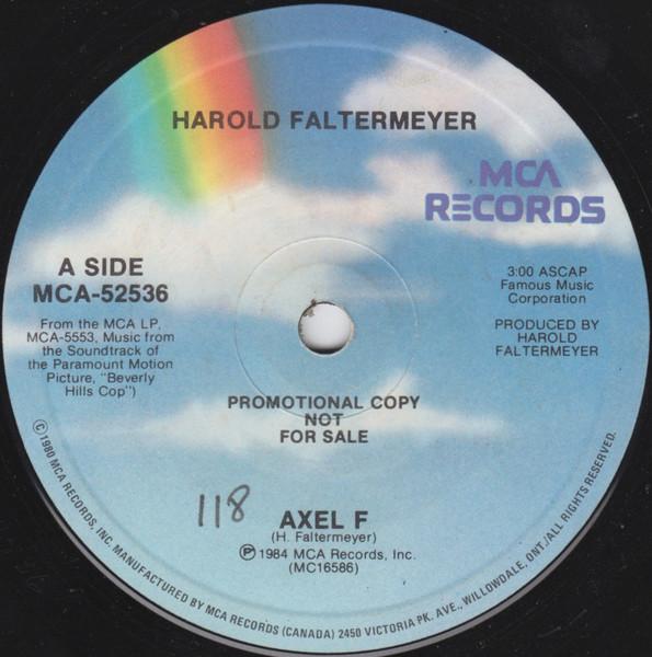 

7-дюймовая пластинка HAROLD FALTERMEYER Axel F MCA52536PROMO MCA Records 1984 Канада Саундтреки Мюзиклы Б/у