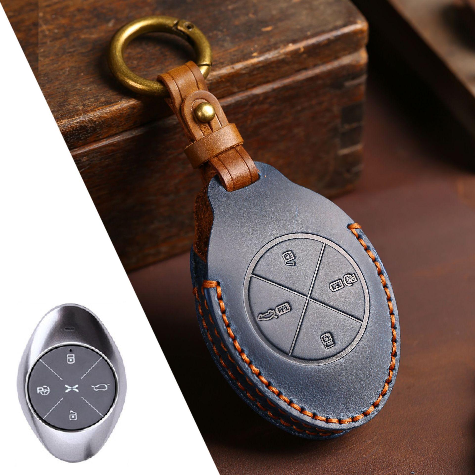 

Applicable to XPeng Motors key case P7 genuine leather G3 key case high-end protective case 2021 all-inclusive cowhide синій