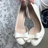 2025 neue cremeweiße Seite leer einzelne Schuhe süßer Wind runde Zehe Schleife hohe Absätze leichter Mund Stiletto Retro