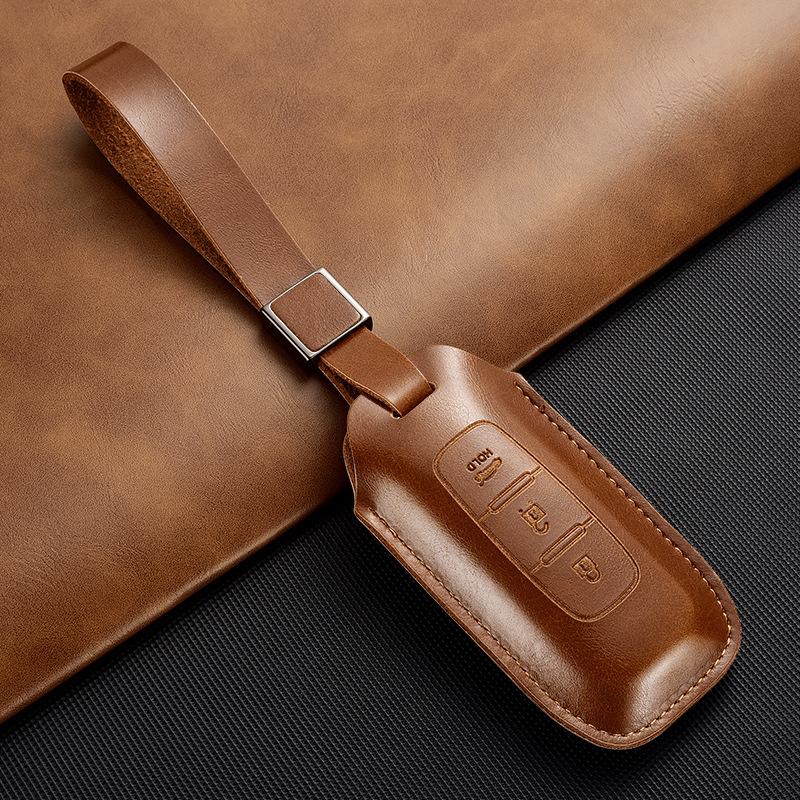 Suitable for Nissan Leather Key Cover 14th Generation Xuanyi Teana Qashqai Tan Lu Qi Juntiida Jinke Loulan Car Buckle Case