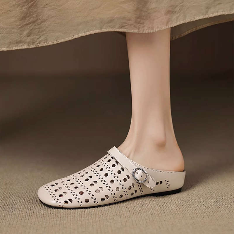 Hollow flat heel soft sole one-word buckle with lazy slippers 2025 new bag head thick heel fashion versatile sandals women