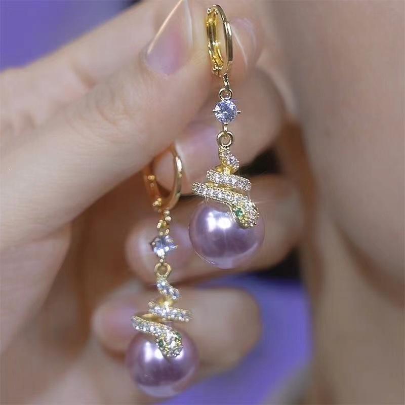 

Модные серьги-подвески со стразами в виде змеи для женщин и девочек, новинка 2025 года, ювелирные изделия в подарок фиолетовый