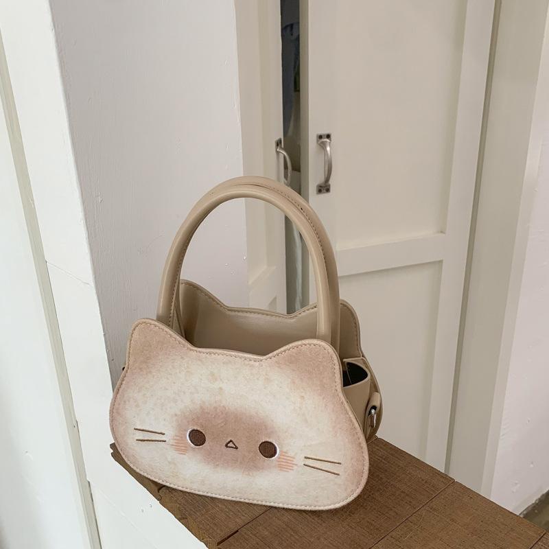 

2025 Новая мультяшная сумка-тоут с кошкой-тостом, женская, милая, универсальная, большой вместимости, изящная на плечо, кроссбоди 24*8*14