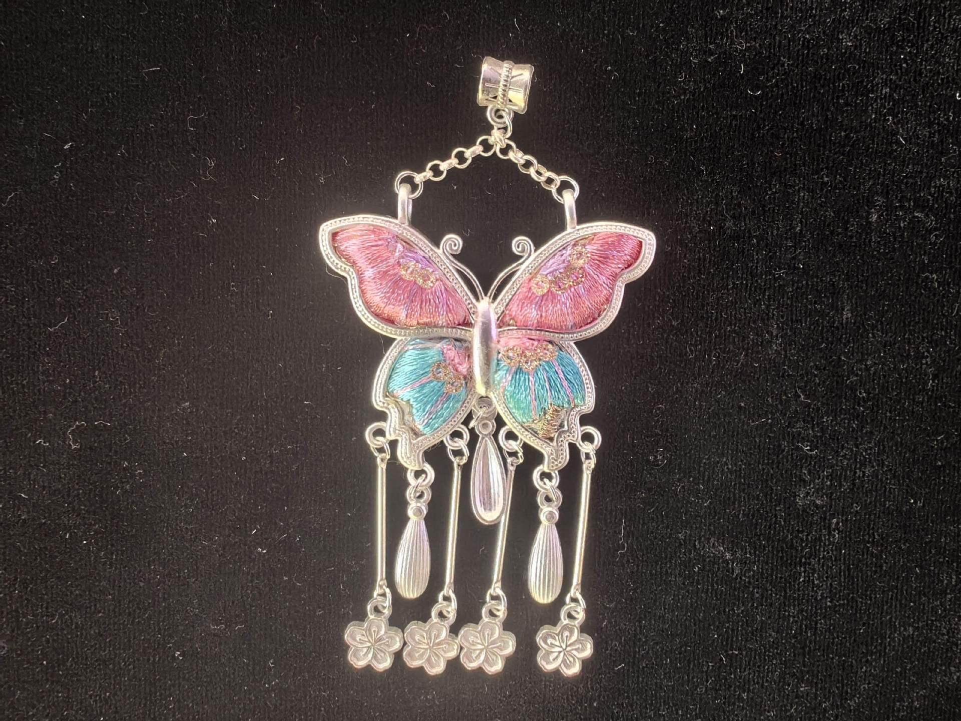 Ethnic Qipao Pendant: Miao Silver Butterfly with Embroidery in Blue, Pink, Yellow, and Green.