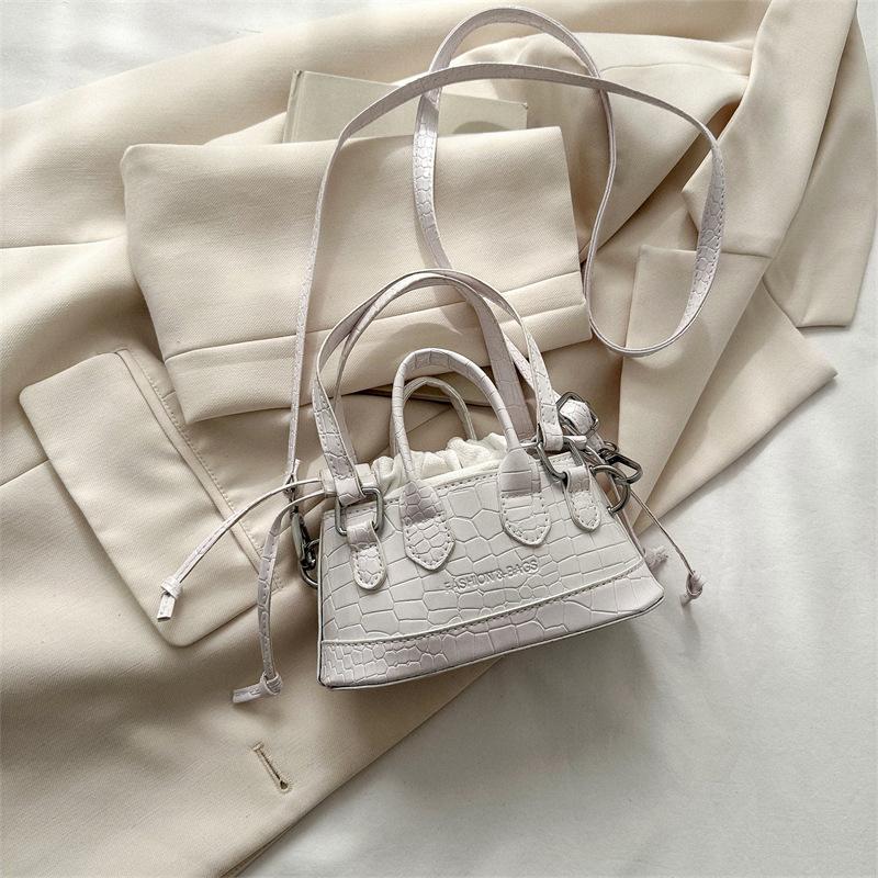 Niche design small bag women's spring new fashion simple hand bag casual commuter messenger bag women's bag