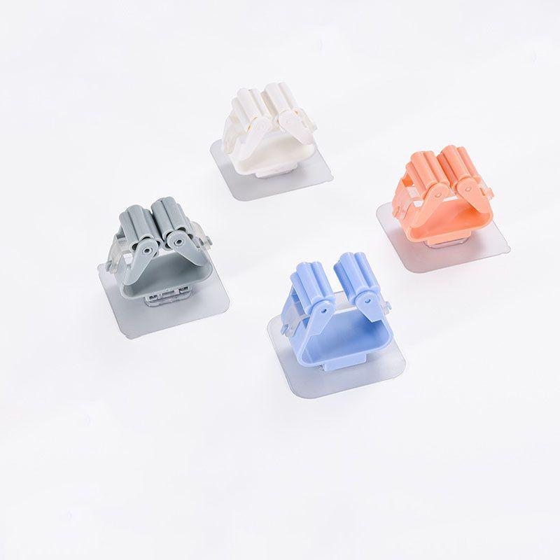 Versatile Wall Mounted Mop Organizer Holder With Durable Non-slip Design For Efficient Storage