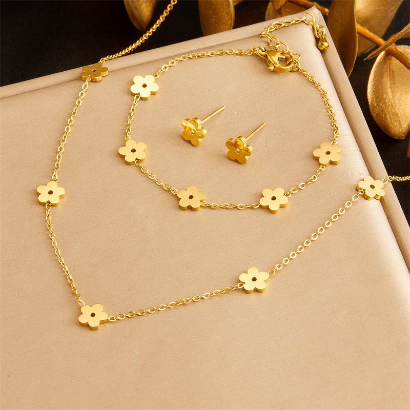 Gold Flower Charm Jewelry Set with Necklace Bracelet and Stud Earrings
