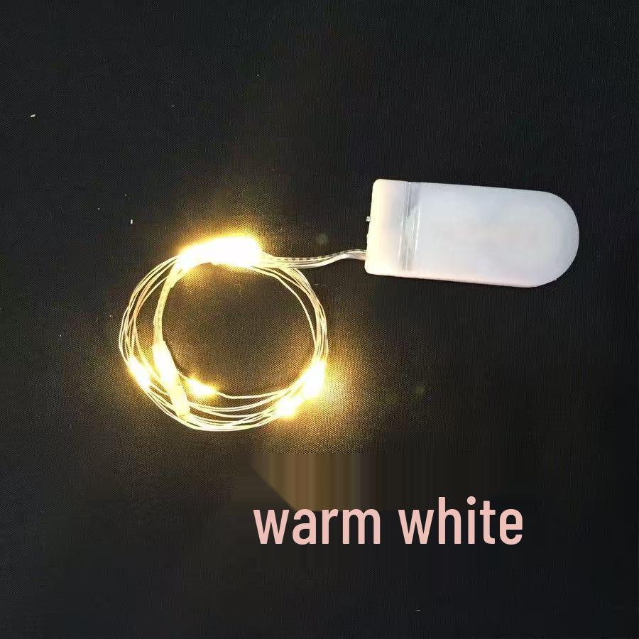 

Світлодідні гірлянди з мідного дроту в маленькій білій коробці