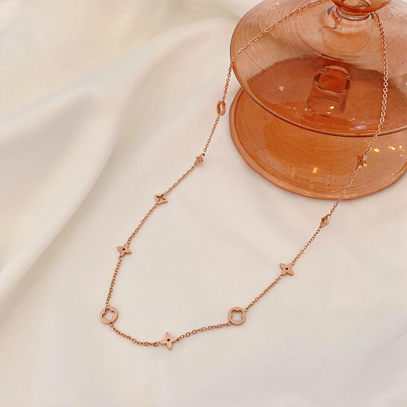 Hollow Four-Leaf Clover Necklace: Titanium Steel Clavicle Chain for Women - Elegant, Simple Design