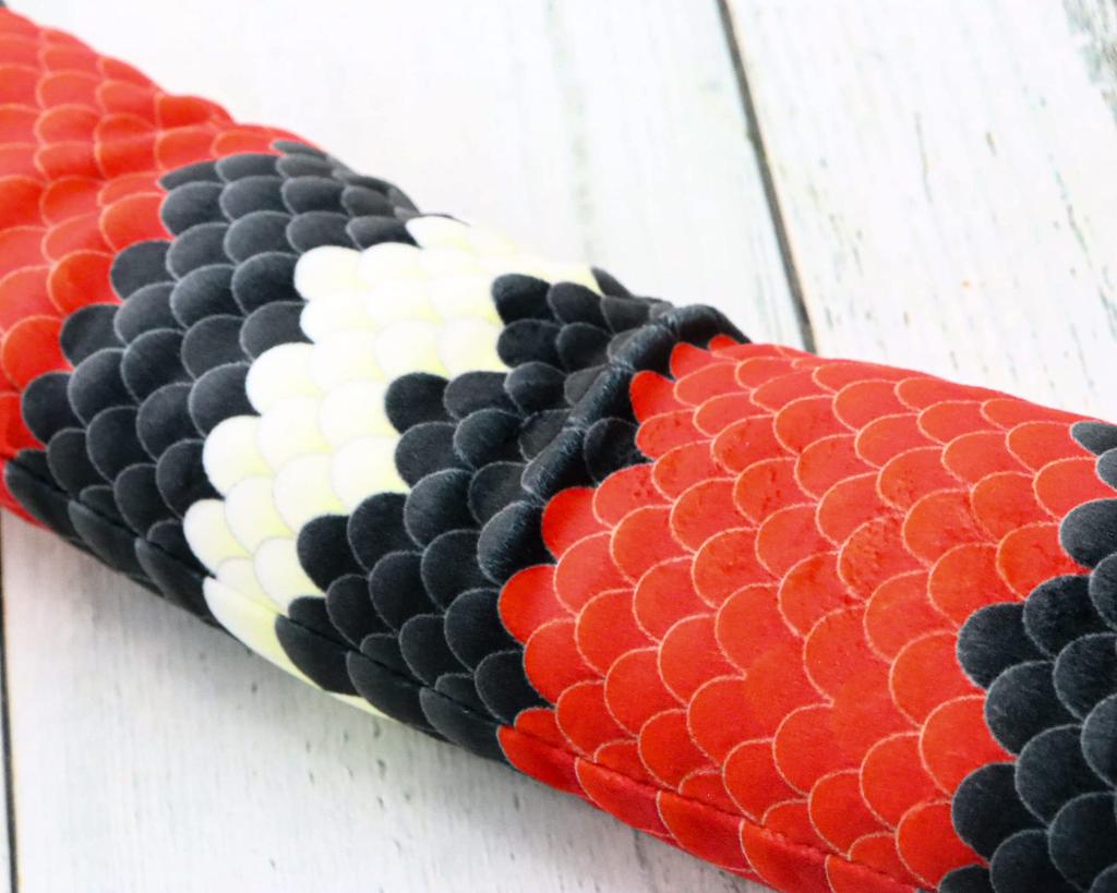 Plüsch-Milchschlange zum Ausziehen