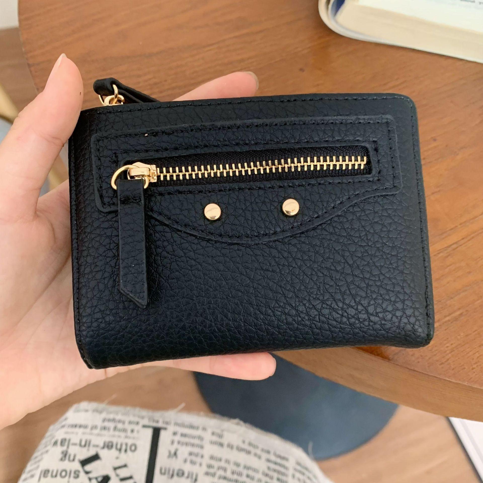 

New zipper women s short wallet simple multi-card position rivet lychee pattern coin small change bag чорний