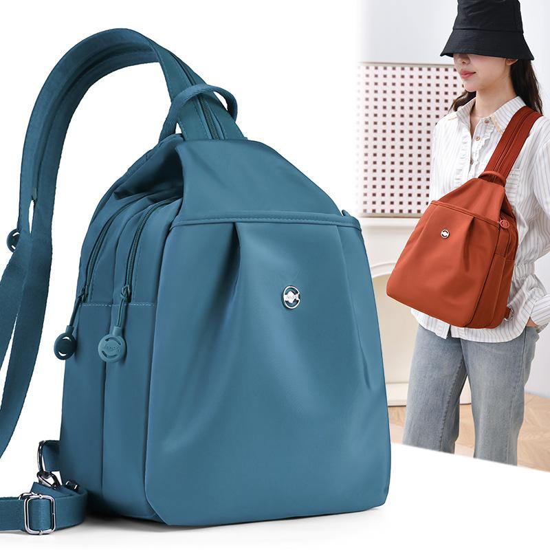 Compact Backpack with Adjustable Straps and Front Zipper Pocket