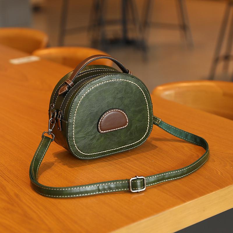 New Small Round Bag with Large Capacity  High End and Fashionable Women's Hand Held Crossbody Bag