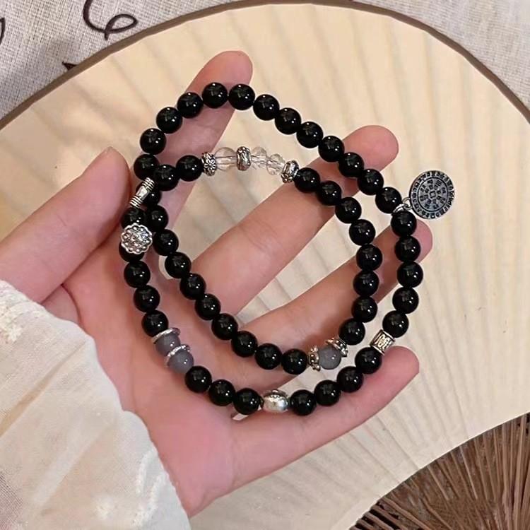 Sophisticated Black Beaded Bracelet For Women With Unique Design Elements