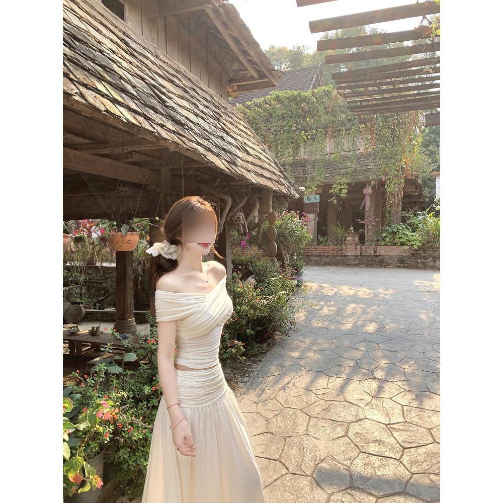 Summer new fashion versatile high-end design sense elastic one-word shoulder slim and thin knitted top long skirt set