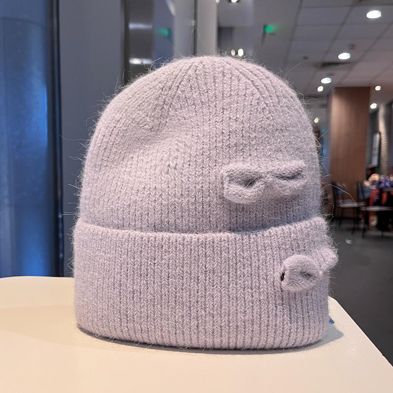 Korean version of fashion hole knitted wool hat men and women autumn and winter outdoor warm bag head cold hat lazy knitted hat