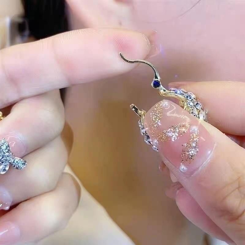 High-end and Elegant Purple Full-diamond Stud Earrings with Blue Ear Clasps - A Classic and Versatile Accessory for All Occasions.