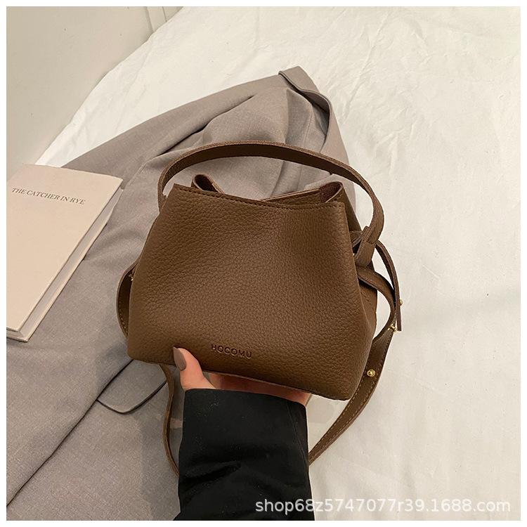 Fashion design hand-held small bag bag women's 2025 new retro versatile bucket bag women's commuter shoulder crossbody bag