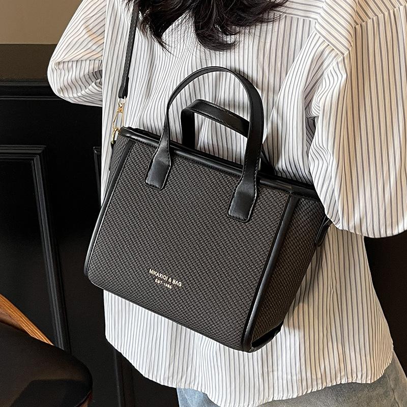 2025 spring and summer new high-end texture niche portable vegetable basket bag women's commuting versatile temperament messenger bag